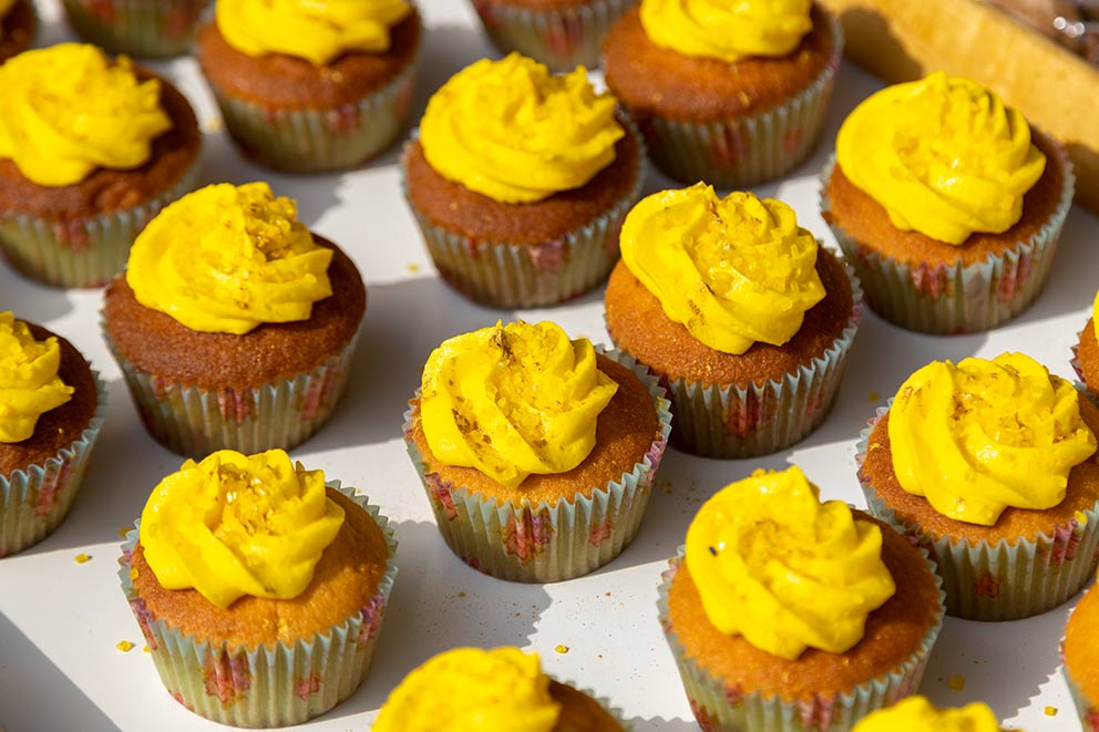 Cupcakes with yellow icing.