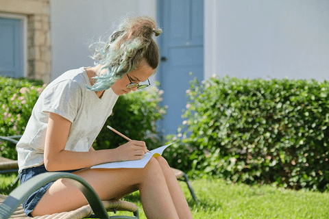Young person sat in a chair reflecting on their views about wildlife.