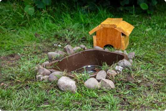 a washing up bowl used in the garden to make a pond to attract wildlife