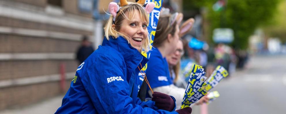 RSPCA staff and volunteers at the London Marathon RSPCA cheer point near mile 14.