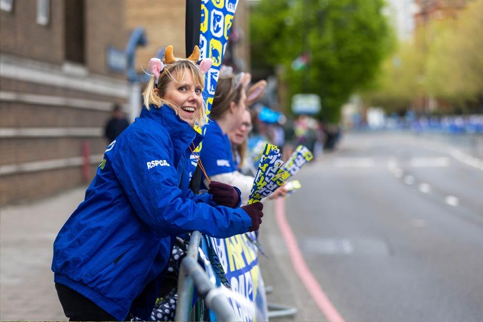 RSPCA supporters cheering at an organised charity event.