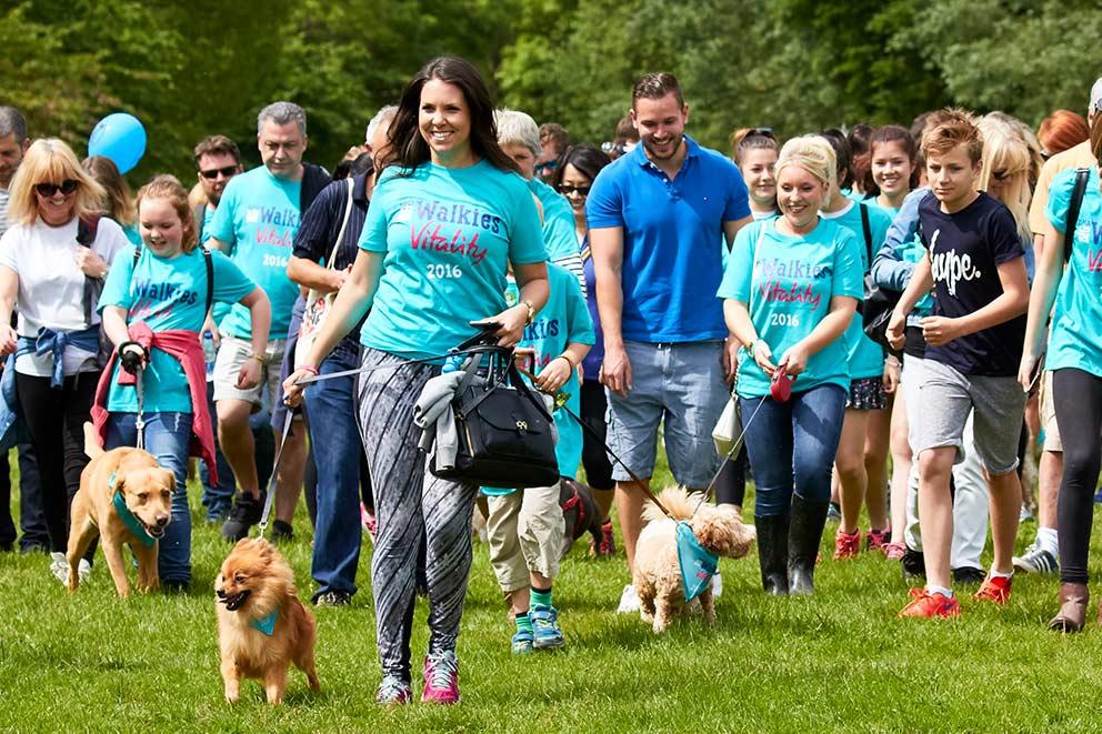 Fundraisers starting out on a charity dog walk.