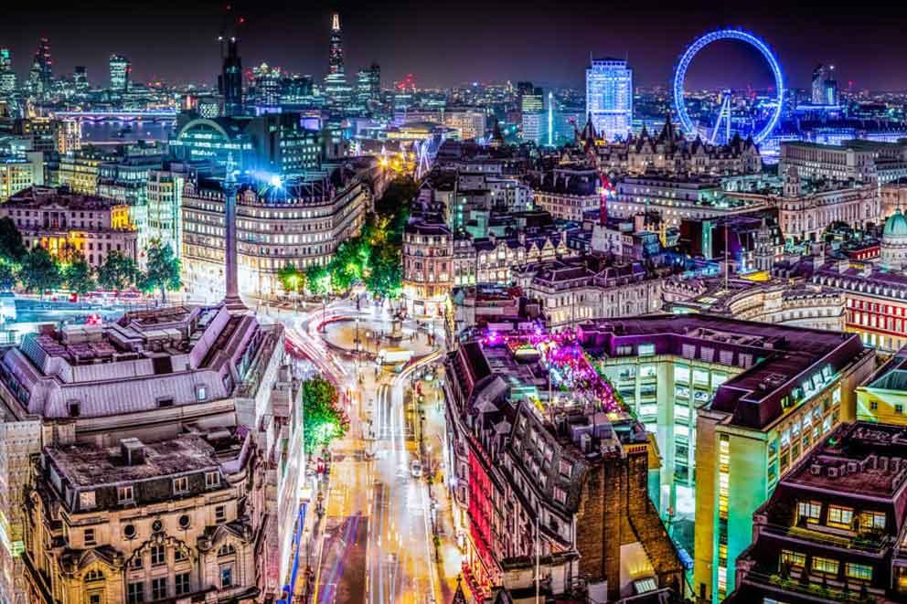 Aerial view of the London skyline at night.